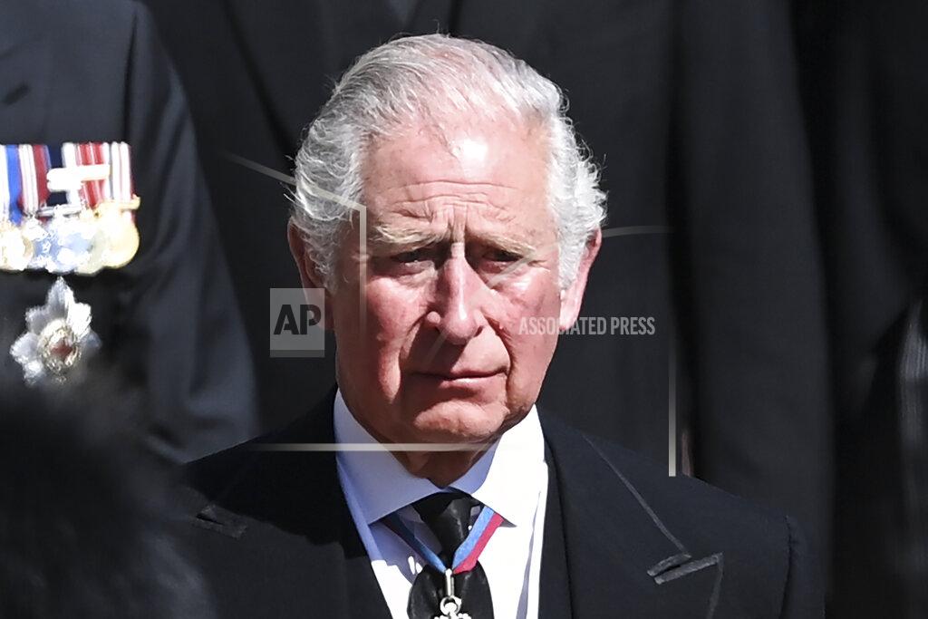 Leon Neal Britain's Prince Charles sheds a tear as he follows the coffin as it makes it's way past the Round Tower during the funeral of Britain's Prince Philip inside Windsor Castle in Windsor, England Saturday April 17, 2021. (Leon Neal/Pool via AP)