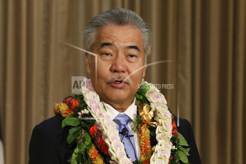 Audrey Mcavoy FILE - In this Jan. 21, 2020, file photo, Gov. David Ige speaks to reporters in Honolulu after delivering his state of the state address at the Hawaii State Capitol. While governors across the country are ending all or most of their coronavirus restrictions, many of them are keeping their pandemic emergency orders in place. Those orders allow them to restrict public gatherings and businesses, mandate masks, sidestep normal purchasing rules, tap into federal money and deploy National Guard troops to administer vaccines. (AP Photo/Audrey McAvoy, File)