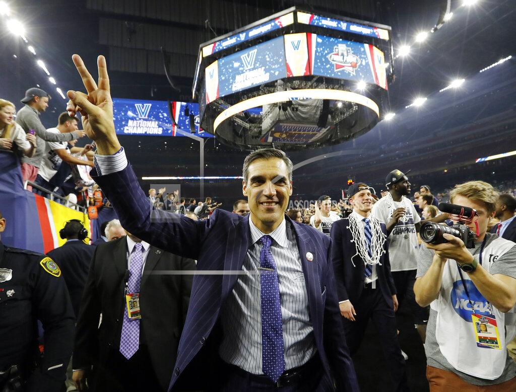 David J. Phillip FILE - In this April 4, 2016, file photo, Villanova head coach Jay Wright celebrates after the NCAA Final Four tournament college basketball championship game against North Carolina, in Houston. (AP Photo/David J. Phillip, File)