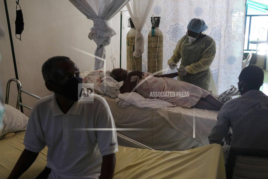 Matias Delacroix FILE - In this Saturday, July 17, 2021 file photo, a healthcare worker attends to a COVID-19 patient in the intensive care unit of the a hospital in Port-au-Prince, Haiti. U.S. hospitalizations and deaths are nearly all among the unvaccinated, and real-world data from Britain and Israel support that protection against the worst cases remains strong in 2021. What scientists call “breakthrough” infections in people who are fully vaccinated make up a small fraction of cases. (AP Photo/Matias Delacroix)