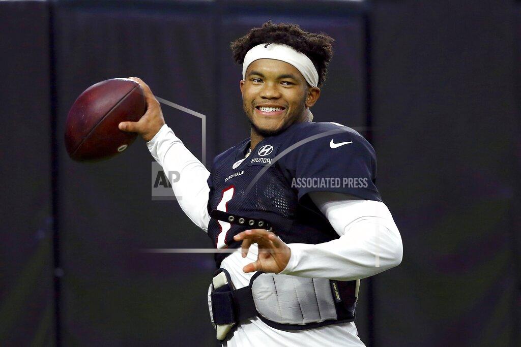 Ross D. Franklin Arizona Cardinals quarterback Kyler Murray smiles as he throws a pass during an NFL football training camp practice at State Farm Stadium Tuesday, Aug. 6, 2019, in Glendale, Ariz. (AP Photo/Ross D. Franklin)