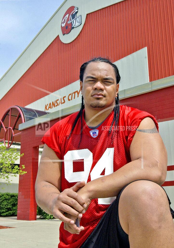 Joe Ledford This is a 2004 photo showing Kansas City Chiefs football player Saousoalii Siavii Jr. at the NFL football team's training camp. A former defensive tackle for the Chiefs, Dallas Cowboys and Seattle Seahawks has been charged with illegally possessing firearms. The U.S. attorney's office said Monday, Aug. 26, 2019, in announcing the charges against 40-year-old Saousoalii Siavii Jr. that he was twice stunned with a Taser after he resisted arrest when he was taken into custody in August. The confrontation began after he was spotted getting out of a vehicle that had been reported stolen. Prosecutors say he fought off officers in the Kansas City suburb of Independence before he was restrained. (Joe Ledford/The Kansas City Star via AP)