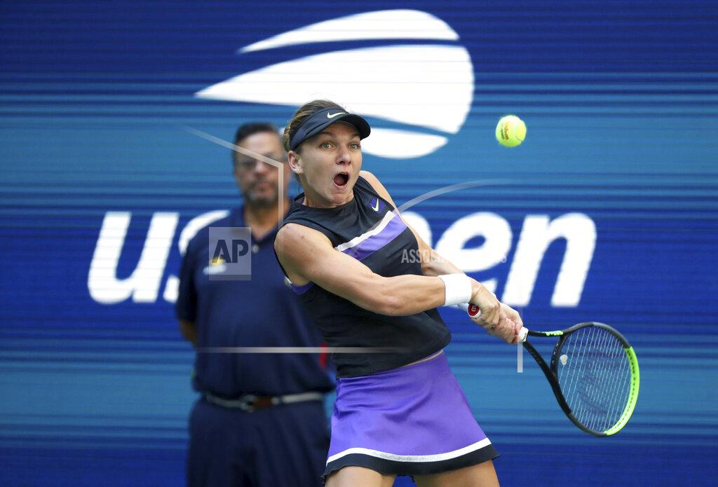 Kevin Hagen FILE - In this Aug. 29, 2019, file photo, Simona Halep, of Romania, returns a shot to Taylor Townsend during the second round of the U.S. Open tennis championships in New York. Halep says she will skip the U.S. Open. She says she wants to put her health first and prefers to stay in Europe amid the coronavirus pandemic. (AP Photo/Kevin Hagen, File)