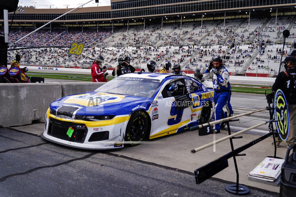 Brynn Anderson NASCAR Cup Series driver Chase Elliott leaves the track ending his race after smoke was seeming coming from his car during a NASCAR Cup Series at Atlanta Motor Speedway on Sunday, March 21, 2021, in Hampton, Ga. (AP Photo/Brynn Anderson)