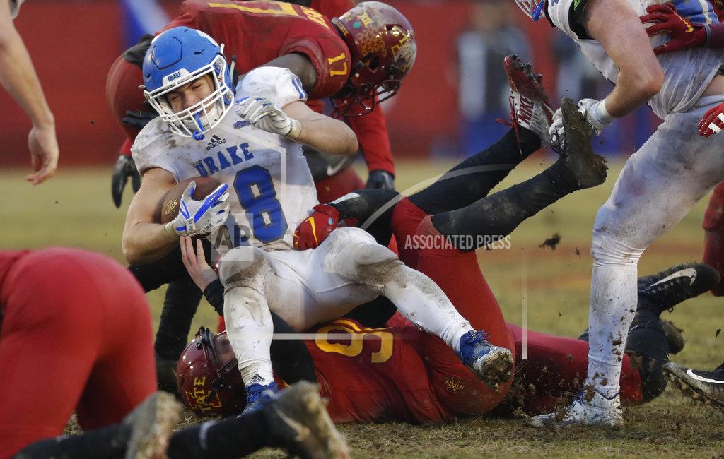 Charlie Neibergall Drake's Braeden Hartwig (18) is tackled by Iowa State kicker Connor Assalley while returning a kickoff during the second half of an NCAA college football game, Saturday, Dec. 1, 2018, in Ames, Iowa. Iowa State won 27-24. (AP Photo/Charlie Neibergall)