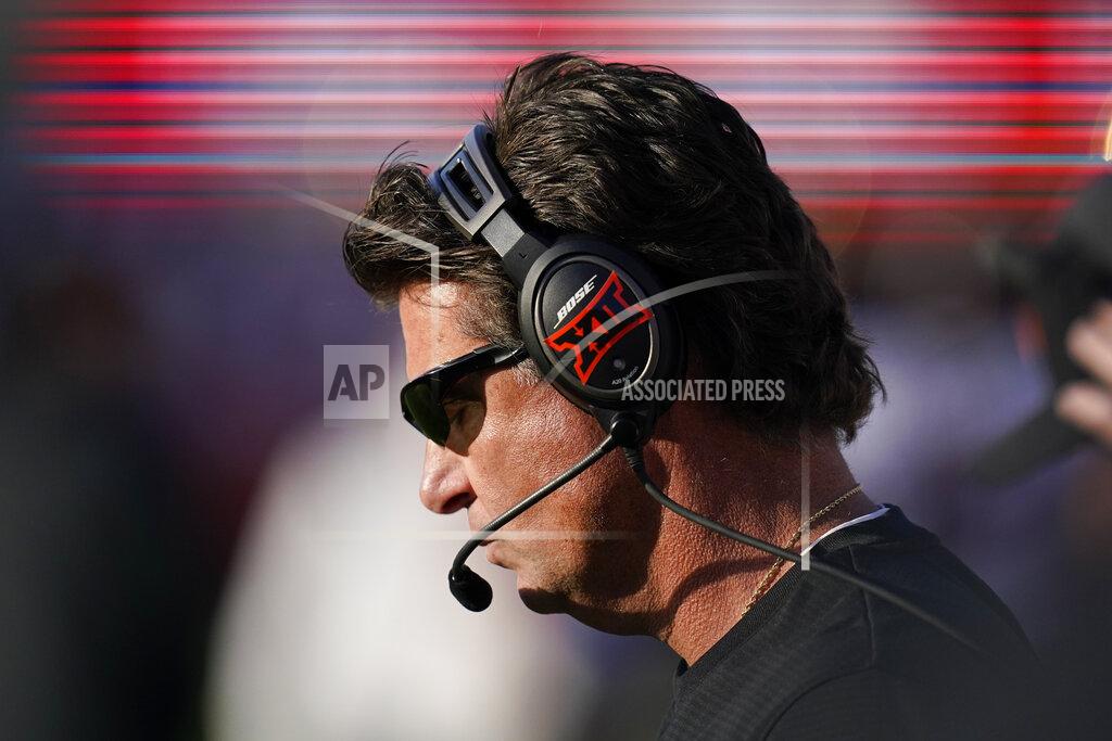 Charlie Neibergall Oklahoma State head coach Mike Gundy stands on the sideline during the second half of an NCAA college football game against Iowa State, Saturday, Oct. 23, 2021, in Ames, Iowa. Iowa State won 24-21. (AP Photo/Charlie Neibergall)