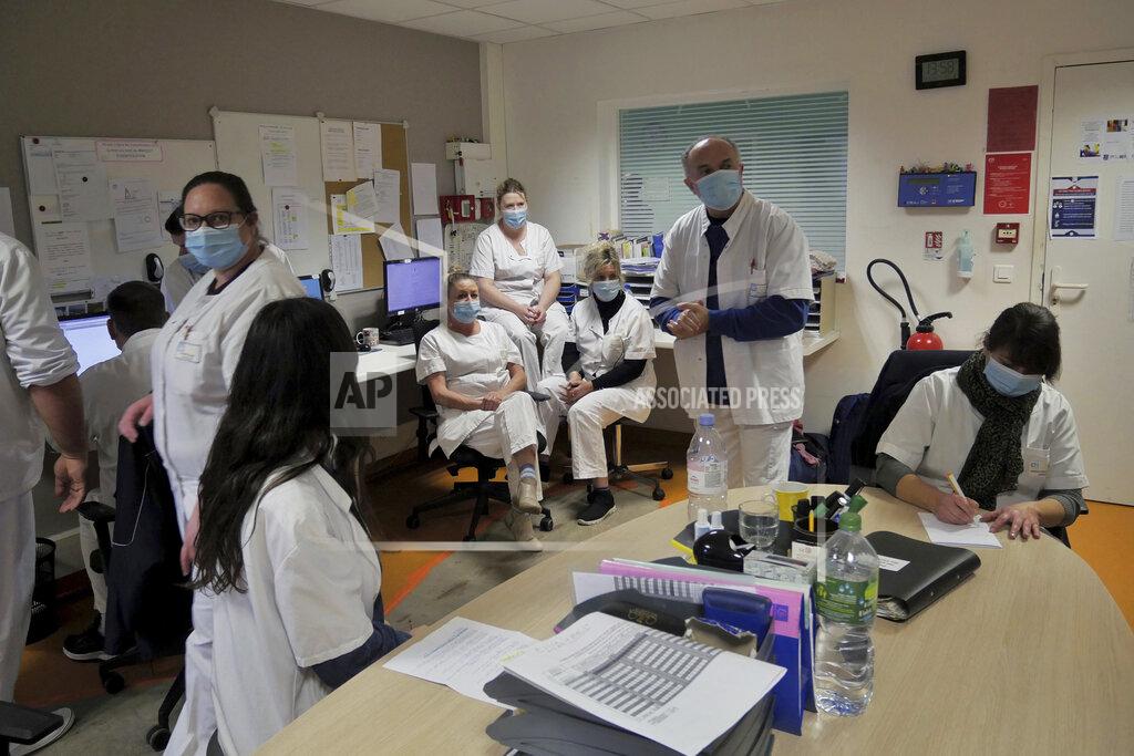 Thibault Camus Medical staff have a team meeting at the emergency ward of the Rouvray psychiatric hospital, in Rouen, western France, Wednesday, Nov. 25, 2020. Lockdowns that France has used to fight the coronavirus have come at considerable cost to mental health. Surveying points to a surge of depression most acute among people without work, in financial hardship and young adults. (AP Photo/Thibault Camus)