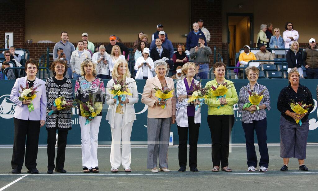 FILE - In this April 7, 2012, file photo, members of the original nine women, from left to right, Billie Jean King, Peaches Bartkowicz, Kristy Pigeon, Valerie Ziegenfuss, Judy Tegart Dalton, Julie Heldman, Kerry Melville Reid, Nancy Richey and Rosie Casals, who helped start the women's professional tennis tour are honored at the Family Circle Cup tennis tournament in Charleston, S.C. Billie Jean King and the other members of the Original 9 who laid the groundwork for the women’s professional tour are the first group elected together to the International Tennis Hall of Fame, joining Lleyton Hewitt and Dennis Van der Meer in the Class of 2021. In results announced Wednesday, Feb. 24, 2021. (AP Photo/Mic Smith, File)
