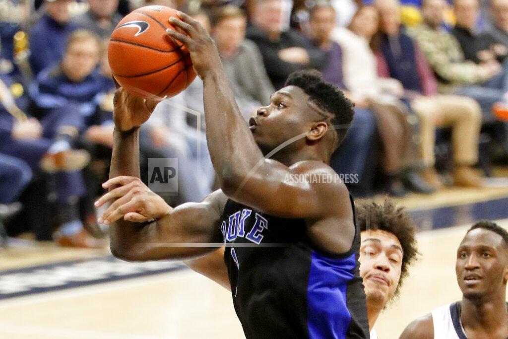 Keith Srakocic Duke's Zion Williamson, left, is fouled by Pittsburgh's Kene Chukwuka as he shoots during the second half of an NCAA college basketball game, Tuesday, Jan. 22, 2019, in Pittsburgh. (AP Photo/Keith Srakocic)