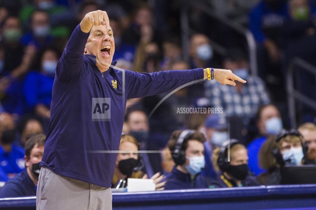 Robert Franklin Notre Dame head coach Mike Brey directs players during an NCAA college basketball game against Kentucky, Saturday, Dec. 11, 2021, in South Bend, Ind. (AP Photo/Robert Franklin)