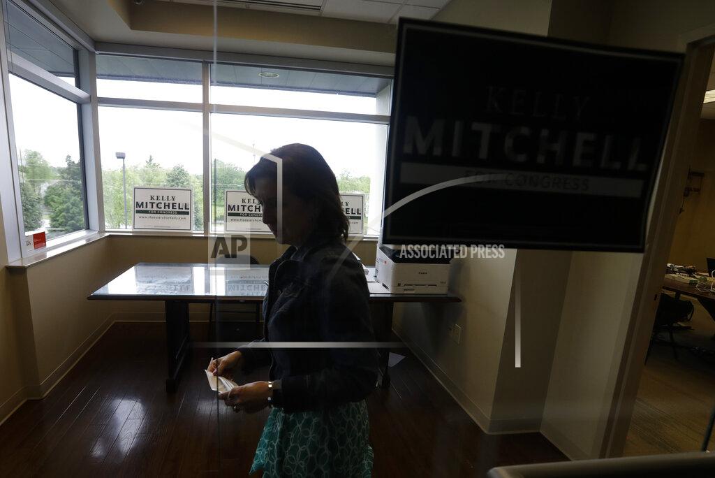 Darron Cummings Indiana State Treasurer Kelly Mitchell leaves her campaign office, Thursday, May 28, 2020, in Westfield, Ind. Mitchell is a candidate for Indiana's 5th Congressional District. More Republican women than ever are seeking House seats this year after the 2018 election further diminished their limited ranks in Congress. But so far it appears that any gains this November could be modest. (AP Photo/Darron Cummings)