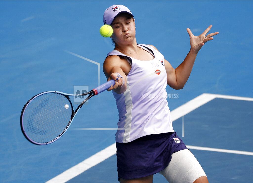 Rick Rycroft Australia's Ash Barty makes a forehand return to compatriot Daria Gavrilova during their second round match at the Australian Open tennis championship in Melbourne, Australia, Thursday, Feb. 11, 2021.(AP Photo/Rick Rycroft)