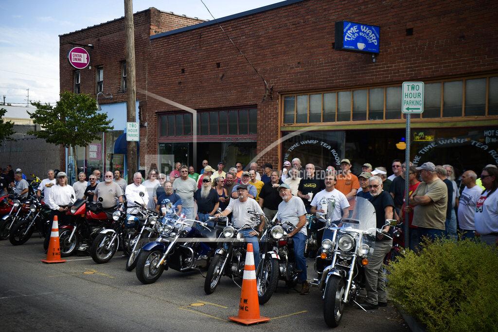 Calvin Mattheis Time Warp Vintage Motorcycle Club in Knoxville, Tenn., pictured on June 28, 2022, was formed in 2003 and is now more than 250 members strong. The club meets regularly at Time Warp Tea Room on North Central Street, which closed its doors this week after 20 years of business in Knoxville. The group visits Twisters Shakes and Sundaes on North Central Street for its next meeting. (Calvin Mattheis/Knoxville News Sentinel via AP)