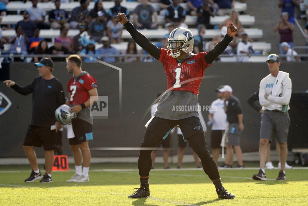 Chuck Burton Carolina Panthers quarterback Cam Newton dances to entertain the crowd during practice at the NFL football team's training camp in Spartanburg, N.C., Thursday, July 25, 2019. (AP Photo/Chuck Burton)