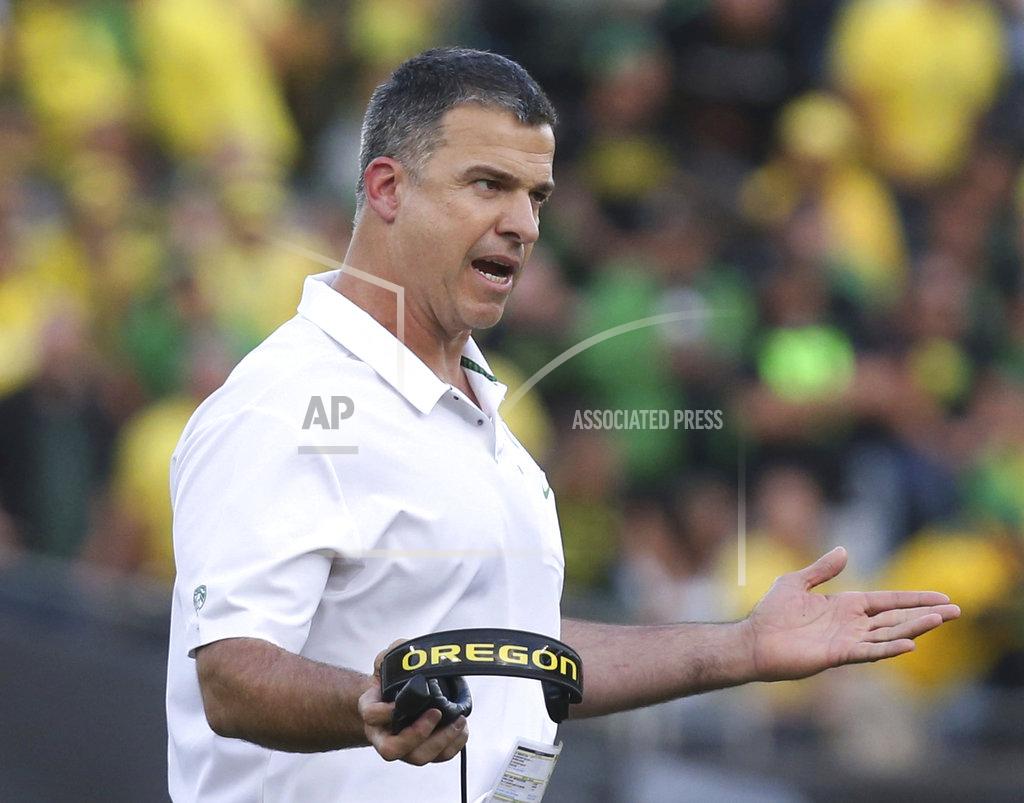 Chris Pietsch FILE - In this Sept. 22, 2018, file photo, Oregon coach Mario Cristobal gestures toward his team during the second half of an NCAA college football game against Stanford in Eugene, Ore. A victory against Arizona State this weekend in Eugene would assure that Oregon finishes above .500. (AP Photo/Chris Pietsch, file)