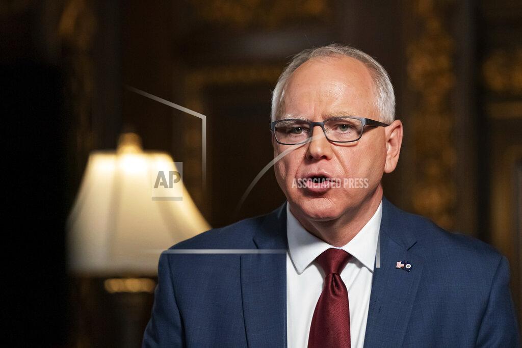 FILE - Minnesota Gov. Tim Walz speaks from the Governor's Reception room at the State Capitol Wednesday, Nov. 18, 2020, in St. Paul, Minn. George Floyd's killing last year and the protests that followed led to a wave of police reforms in dozens of states, from changes in use-of-force policies to greater accountability for officers. At the same time, lawmakers in a handful of states have had success addressing racial inequities. Walz said after the verdicts were read Tuesday that he’s ready to go on the offensive if there is no progress toward racial equity and police accountability. (Glen Stubbe/Star Tribune via AP, Pool, File)