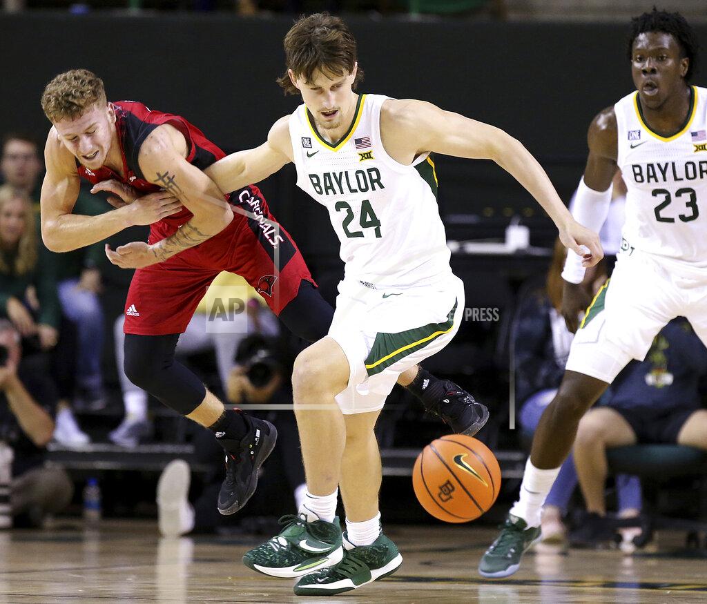 Jerry Larson Baylor guard Matthew Mayer (24) steals the ball from Incarnate Word guard Drew Lutz (3) in the first half of an NCAA college basketball game, Friday, Nov. 12, 2021, in Waco, Texas. (AP Photo/Jerry Larson)