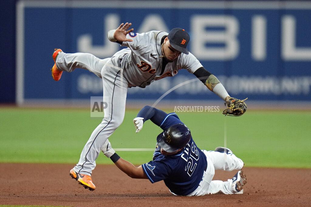 Chris O'MEara Tampa Bay Rays' Ji-Man Choi upends Detroit Tigers shortstop Javier Baez after being forced at second base on a fielder's choice by Randy Arozarena during the fourth inning of a baseball game Tuesday, May 17, 2022, in St. Petersburg, Fla. (AP Photo/Chris O'Meara)