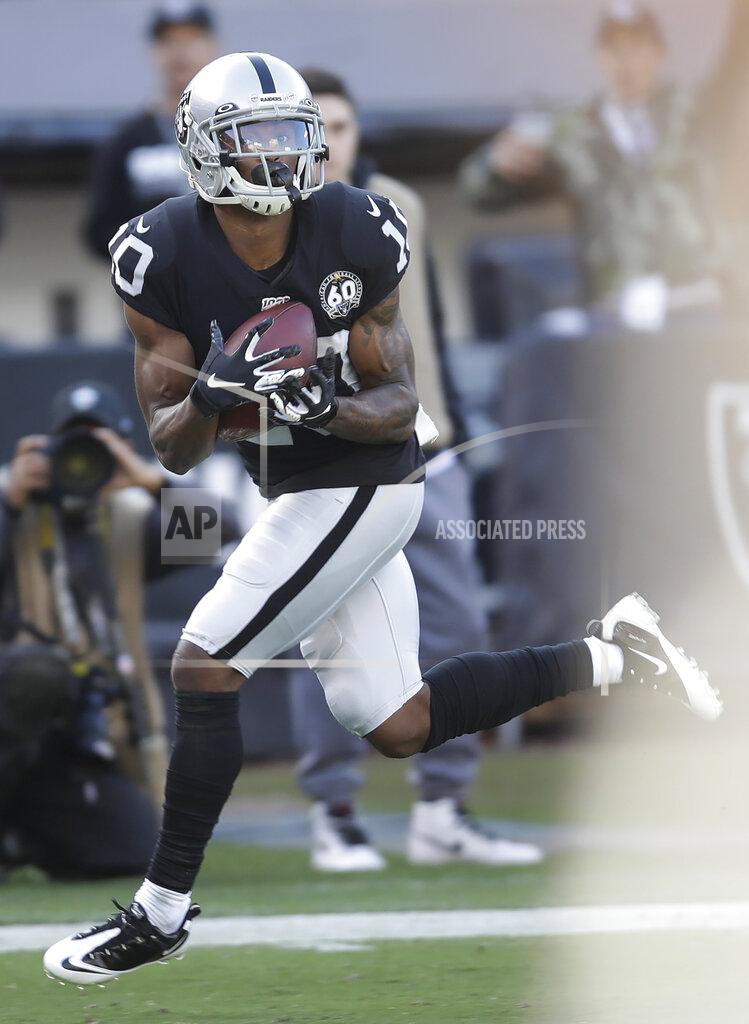 Ben Margot Oakland Raiders wide receiver Rico Gafford (10) catches a touchdown pass against the Tennessee Titans during the first half of an NFL football game in Oakland, Calif., Sunday, Dec. 8, 2019. (AP Photo/Ben Margot)