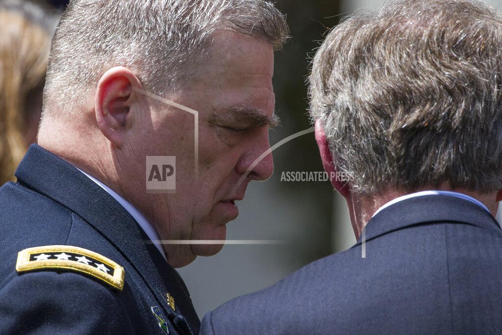 Alex Brandon Army Chief of Staff Gen. Mark Milley, left, talks with national security adviser John Bolton after the presentation of the Commander-in-Chief's Trophy to the U.S. Military Academy at West Point football team, in the Rose Garden of the White House, Monday, May 6, 2019, in Washington. (AP Photo/Alex Brandon)