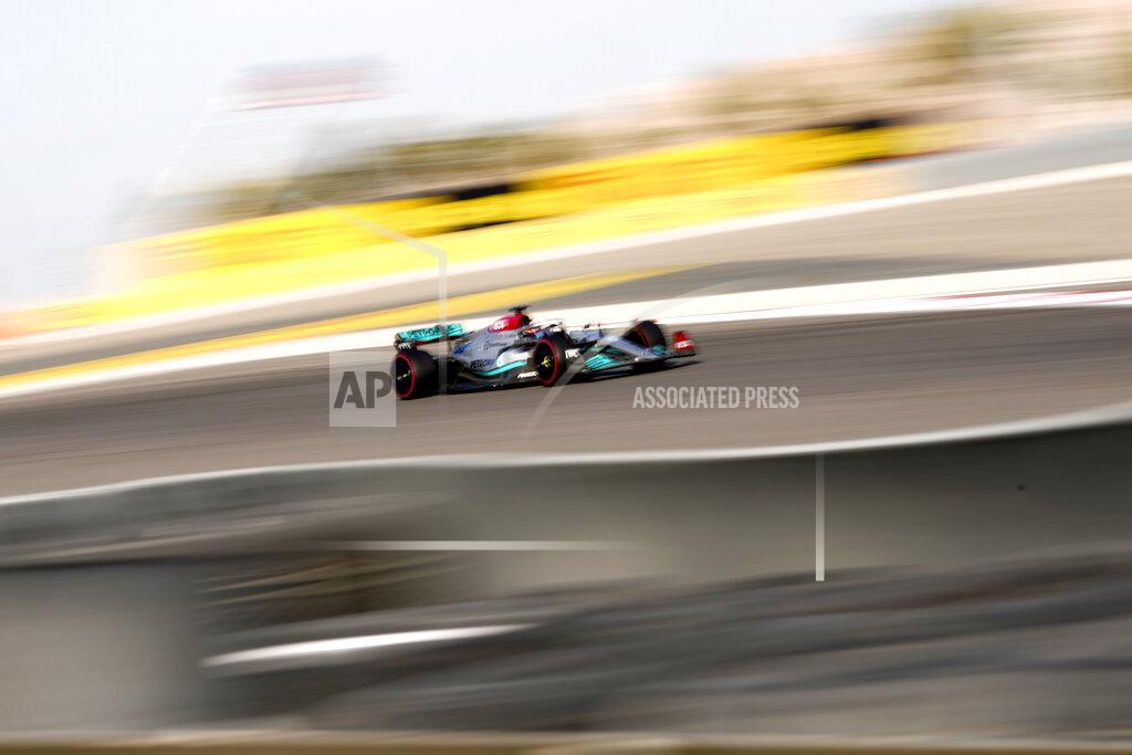 Hassan Ammar Mercedes driver Lewis Hamilton of Britain steers his car during the first free practice at the Formula One Bahrain International Circuit in Sakhir, Bahrain, Friday, March 18, 2022. (AP Photo/Hassan Ammar)