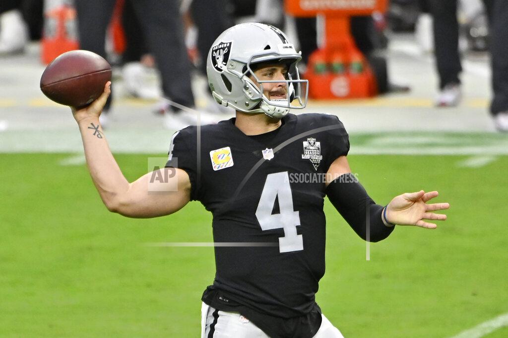 David Becker Las Vegas Raiders quarterback Derek Carr (4) throws against the Tampa Bay Buccaneers during the first half of an NFL football game, Sunday, Oct. 25, 2020, in Las Vegas. (AP Photo/David Becker)