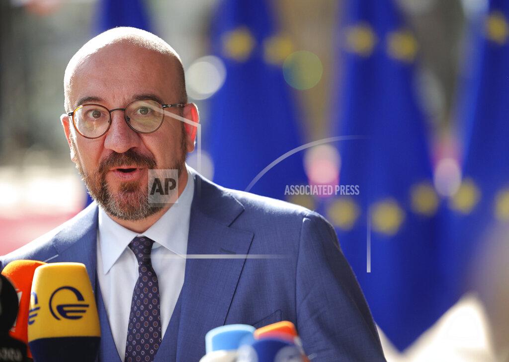 Olivier Matthys European Council President Charles Michel speaks with the media as he arrives for an EU summit in Brussels, Thursday, June 23, 2022. European Union leaders are expected to approve Thursday a proposal to grant Ukraine a EU candidate status, a first step on the long toward membership. The stalled enlargement process to include Western Balkans countries in the bloc is also on their agenda at the summit in Brussels. (AP Photo/Olivier Matthys)