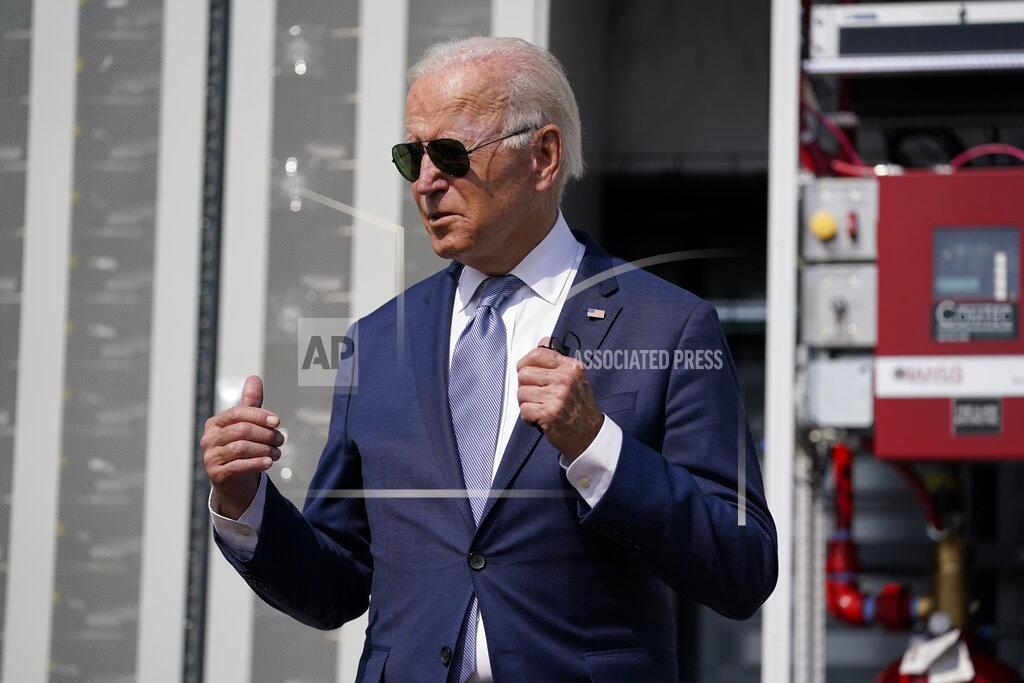 Evan Vucci President Joe Biden speaks during a tour of the Flatirons campus of the National Renewable Energy Laboratory, Tuesday, Sept. 14, 2021, in Arvanda, Colo. (AP Photo/Evan Vucci)