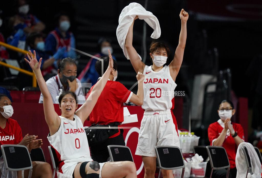 Charlie Neibergall Japan players at the bench celebrate after three point basket during women's basketball preliminary round game against France at the 2020 Summer Olympics, Tuesday, July 27, 2021, in Saitama, Japan. (AP Photo/Charlie Neibergall)