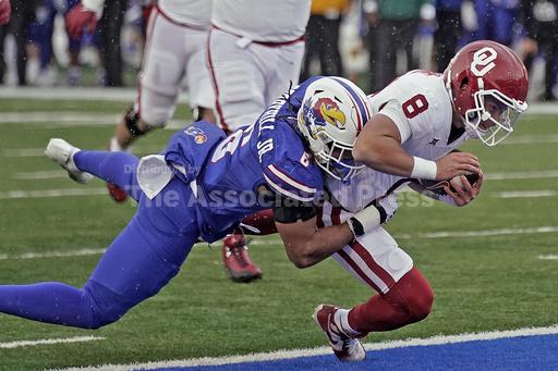 Neal scores go-ahead TD with 55 seconds left, KU holds on to beat No. 6 Oklahoma 38-33 - Vimarsana News