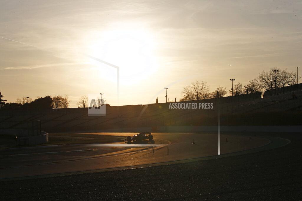 Joan Monfort A racing car stands on the tracks during a Formula One pre-season testing session at the Barcelona Catalunya racetrack in Montmelo, outside Barcelona, Spain, Wednesday, Feb. 19, 2020. (AP Photo/Joan Monfort)