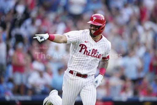 Philadelphia Phillies' Weston Wilson reacts after hitting a home run against Washington Nationals pitcher MacKenzie Gore during the second inning of a baseball game, Wednesday, Aug. 9, 2023, in Philadelphia. (AP Photo/Matt Slocum)