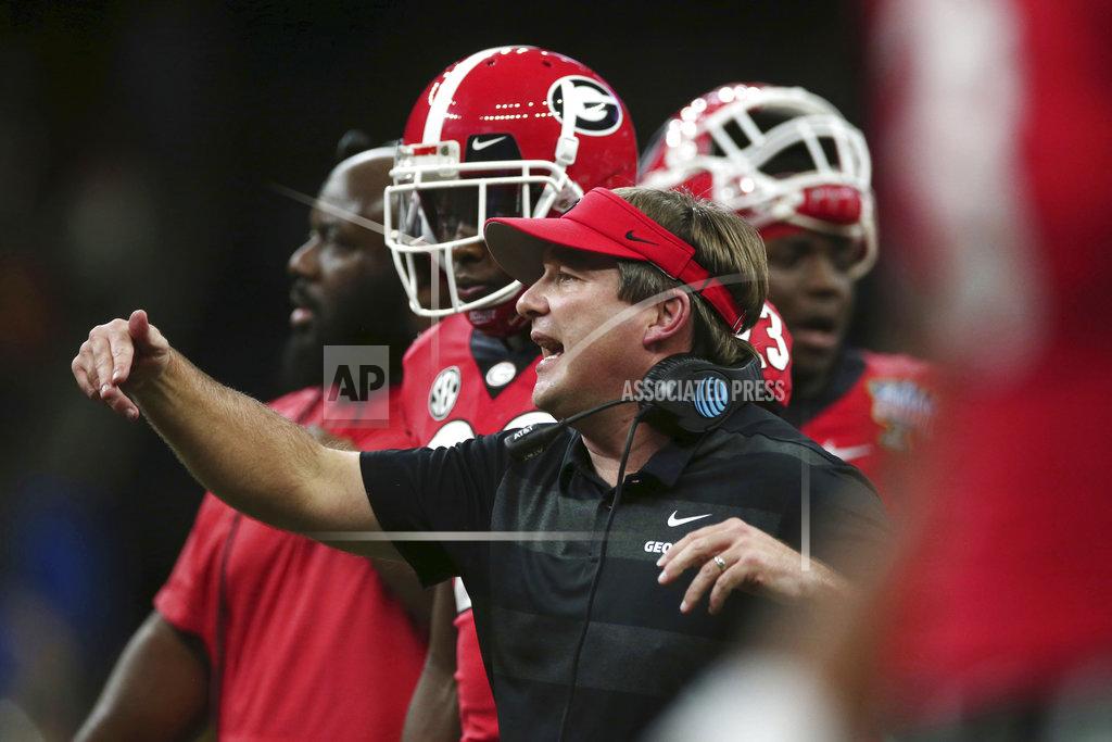 Rusty Costanza Georgia coach Kirby Smart calls out from the sideline during the first half of the team's Sugar Bowl NCAA college football game against Texas in New Orleans, Tuesday, Jan. 1, 2019. (AP Photo/Rusty Costanza)