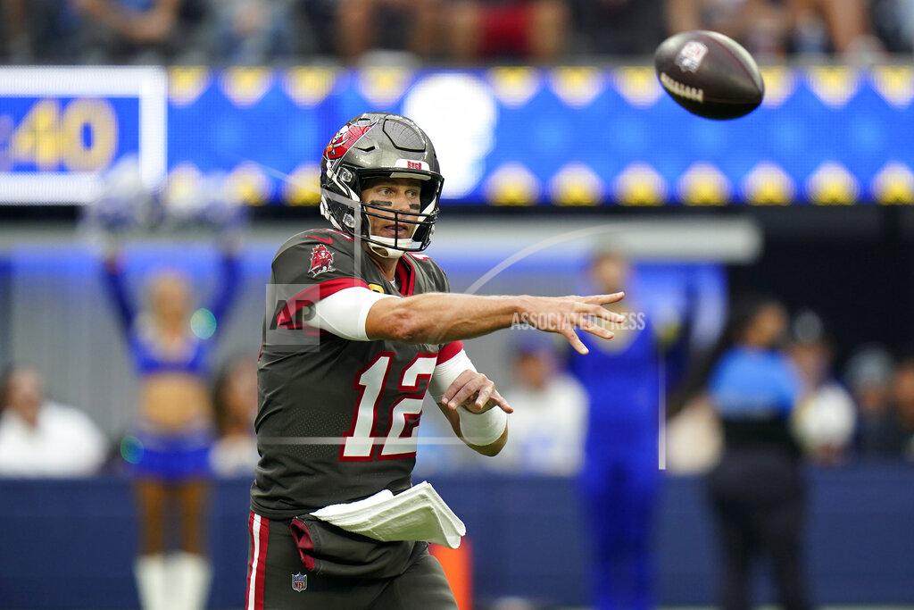 Jae C. Hong FILE - In this Sept. 26, 2021 file photo, Tampa Bay Buccaneers quarterback Tom Brady throws against the Los Angeles Rams during the first half of an NFL football game in Inglewood, Calif. Sports books say the Oct. 3, 2021 game between the Tampa Bay Buccaneers and the New England Patriots, marking Tom Brady’s first return to New England as a visiting player, will be the most bet-on regular season NFL game of the year. (AP Photo/Jae C. Hong, File)