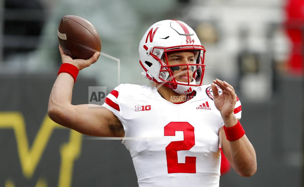 Charlie Neibergall Nebraska quarterback Adrian Martinez warms up before an NCAA college football game against Iowa, Friday, Nov. 23, 2018, in Iowa City, Iowa. (AP Photo/Charlie Neibergall)