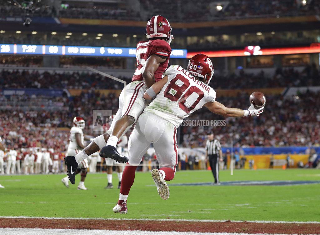 Lynne Sladky Alabama defensive back Xavier McKinney (15) defends Oklahoma tight end Grant Calcaterra (80) in the end zone, during the first half of the Orange Bowl NCAA college football game, Saturday, Dec. 29, 2018, in Miami Gardens, Fla. (AP Photo/Lynne Sladky)