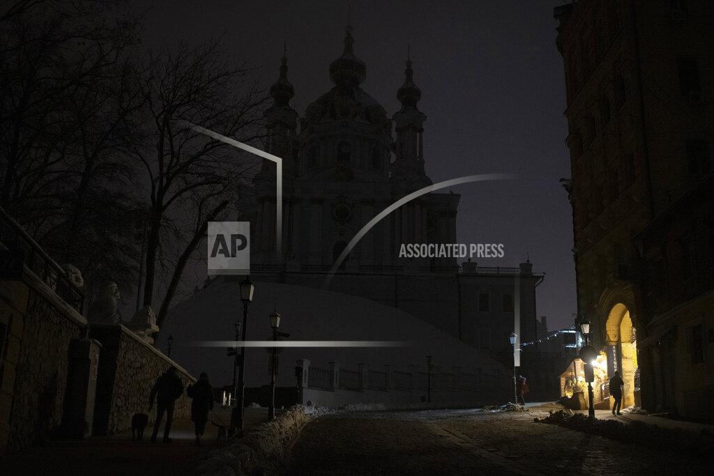 Andrew Kravchenko This photo shows a city center during a blackout after a Russian rocket attack in Kyiv, Ukraine, Wednesday, Nov. 23, 2022. Russia unleashed a new missile onslaught on Ukraine's battered energy grid Wednesday, robbing cities of power and some of water and public transport, too, compounding the hardship of winter for millions. The aerial mauling of power supplies also took nuclear plants and internet links offline and spilled blackouts into neighbor Moldova. (AP Photo/Andrew Kravchenko)