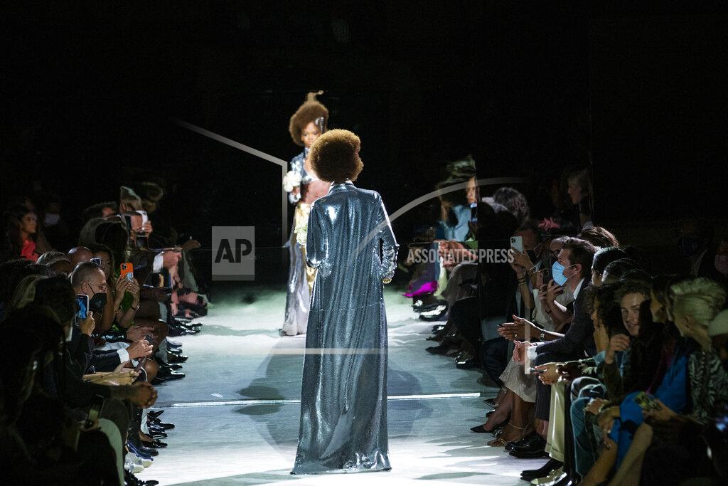Eduardo Munoz Alvarez Models walk the runway at the Tom Ford spring/summer 2022 fashion show at Lincoln Center during New York Fashion Week on Sunday, Sept. 12, 2021. (AP Photo/Eduardo Munoz Alvarez)