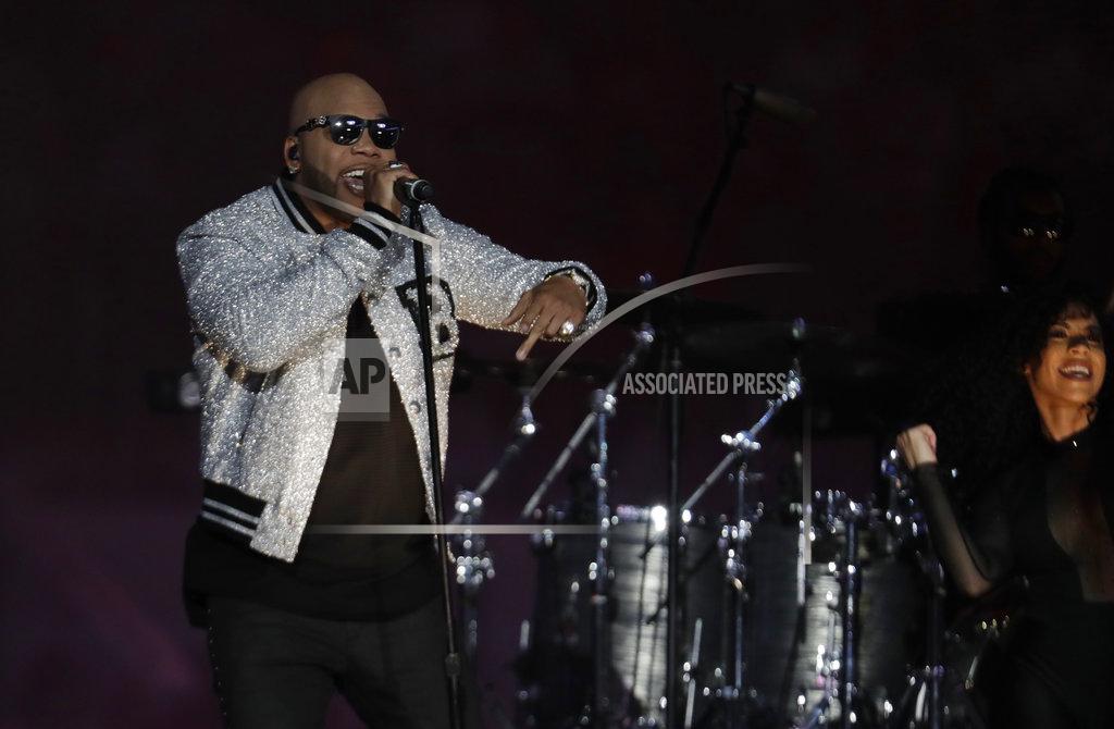 Lynne Sladky Artist Flo Rida performs during the half time show at the Orange Bowl NCAA college football game between Alabama and Oklahoma , Saturday, Dec. 29, 2018, in Miami Gardens, Fla. (AP Photo/Lynne Sladky)
