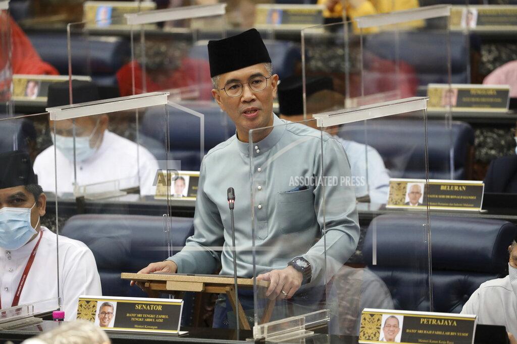 Vincent Thian Malaysia's Finance Minister Zafrul Aziz delivers the 2021 budget speech at parliament in Kuala Lumpur, Malaysia, Friday, Nov. 6, 2020. (AP Photo)