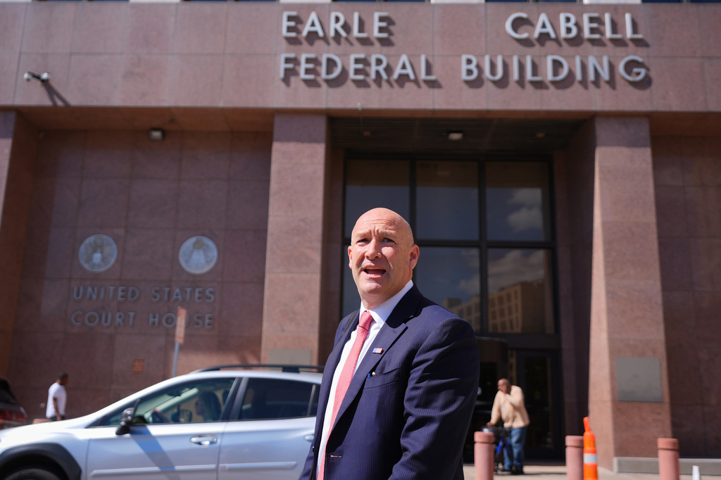 Attorney Bradford Cohen speaks outside the Earle Cabell Federal Building after a detention hearing for his client rapper Pooh Shiesty, whose legal name is Lontrell Williams Jr., in Dallas, Wednesday, April 8, 2026. (AP Photo/LM Otero)