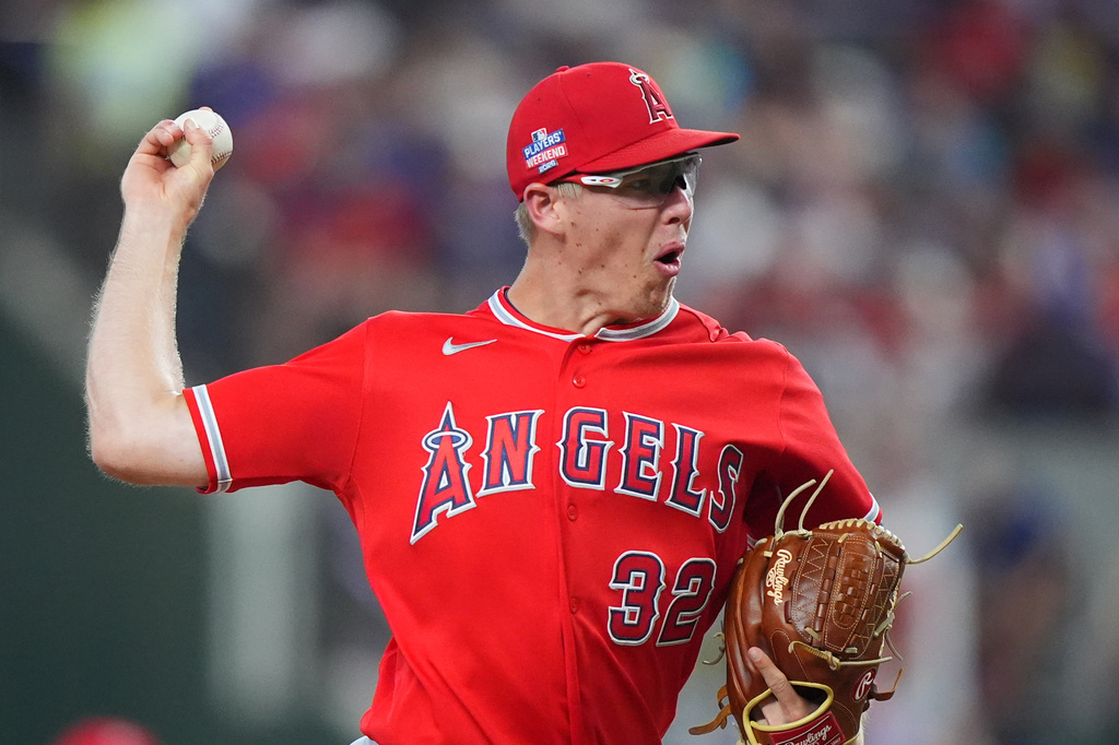 Los Angeles Angels starting pitcher Ryan Johnson throws during the first inning of a baseball game against the Texas Rangers, Saturday, Aug. 22, 2026, in Arlington, Texas. (AP Photo/LM Otero)