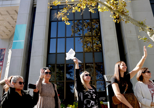 Patricia Knavel of Layton waves a white handkerchief as the processional drives by following the funeral service of President Russell M. Nelson of The Church of Jesus Christ of Latter-day Saints in Salt Lake City on Oct. 7, 2025. (Laura Seitz/The Deseret News via AP) Patricia Knavel of Layton waves a white handkerchief as the processional drives by following the funeral service of President Russell M. Nelson of The Church of Jesus Christ of Latter-day Saints in Salt Lake City on Oct. 7, 2025. (Laura Seitz/The Deseret News via AP)