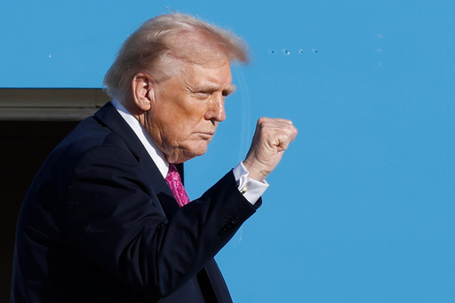 President Donald Trump gestures from the stairs of Air Force One as he boards upon his arrival at Joint Base Andrews, Md., Friday, Oct. 17, 2025. (AP Photo/Luis M. Alvarez) President Donald Trump gestures from the stairs of Air Force One as he boards upon his arrival at Joint Base Andrews, Md., Friday, Oct. 17, 2025. (AP Photo/Luis M. Alvarez)