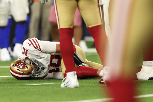San Francisco 49ers quarterback Mac Jones remains on the ground after a play during the second half of an NFL football game against the Los Angeles Rams, Thursday, Oct. 2, 2025, in Inglewood, Calif. (AP Photo/Jessie Alcheh) San Francisco 49ers quarterback Mac Jones remains on the ground after a play during the second half of an NFL football game against the Los Angeles Rams, Thursday, Oct. 2, 2025, in Inglewood, Calif. (AP Photo/Jessie Alcheh)