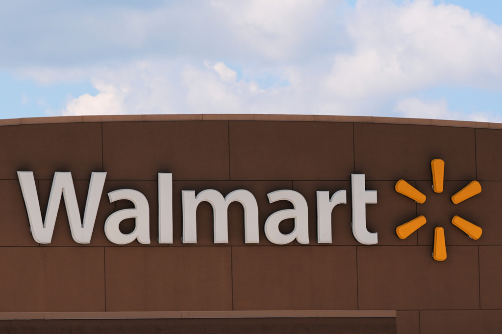 The Walmart logo is displayed on a store, Aug. 14, 2025, in Manchester, N.H. (AP Photo/Charles Krupa, File)