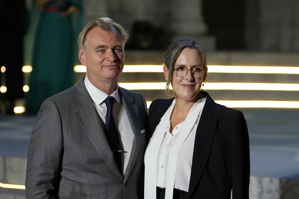 Producer Emma Thomas and director Christopher Nolan pose for a photo during the red carpet event for the movie "The Odyssey" in Seoul, South Korea, Tuesday, Aug. 4, 2026. (AP Photo/Lee Jin-man)
