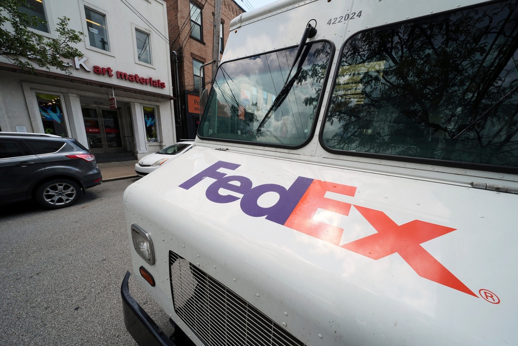 FILE - A FedEx truck makes deliveries in Pittsburgh on Wednesday, June 25, 2025. (AP Photo/Gene J. Puskar, File)