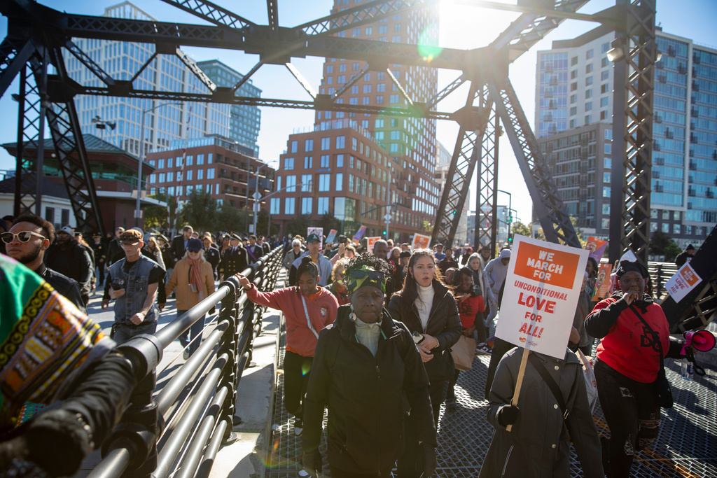 FILE - A crowd marches across the Lefty O'Doul Bridge during the MLK Day March in San Francisco on Monday, Jan. 20, 2025. (Dan Hernandez/San Francisco Chronicle via AP)/San Francisco Chronicle via AP, File)