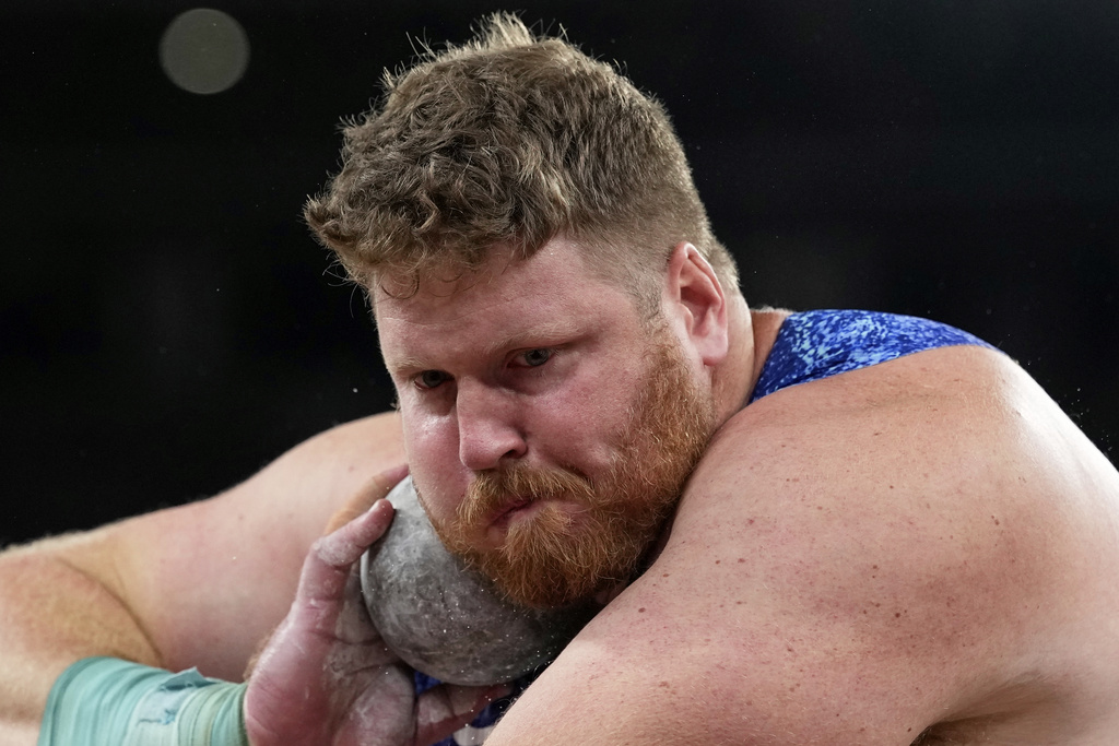 United States' Ryan Crouser makes an attempt in the men's shot put final at the World Athletics Championships in Tokyo, Saturday, Sept. 13, 2025. (AP Photo/Matthias Schrader)